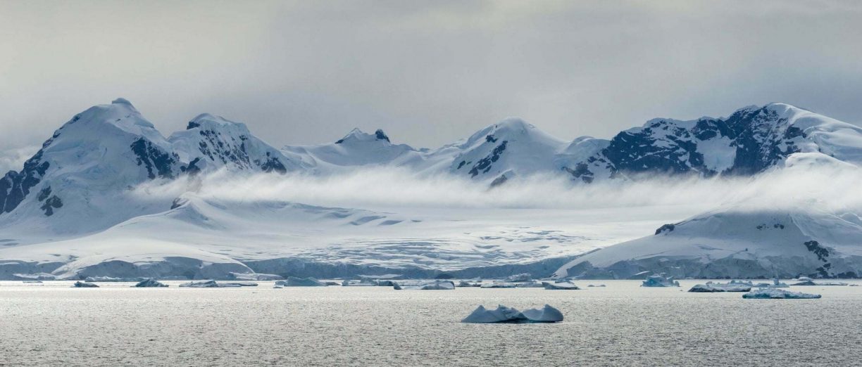 Antarctic mountains and tidewater glacier
